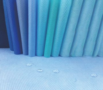 Roll of clear multi-layer laminated plastic barrier film for packaging