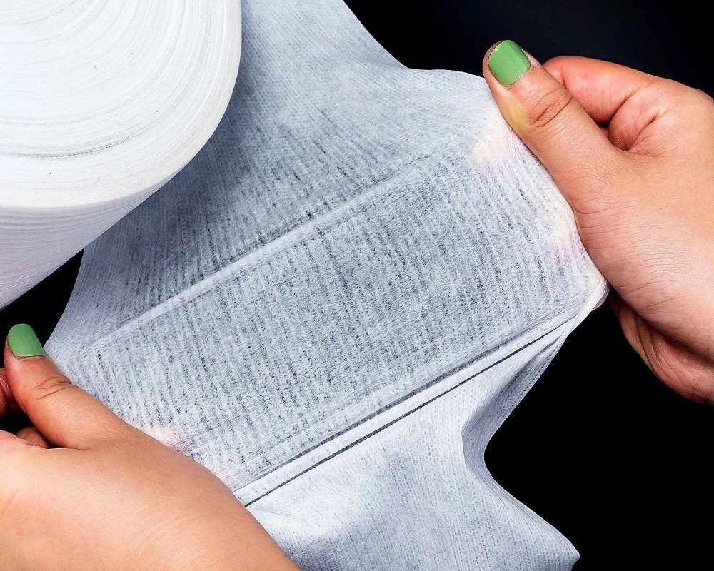 Elastic waist nonwoven material for baby diapers and adult care products