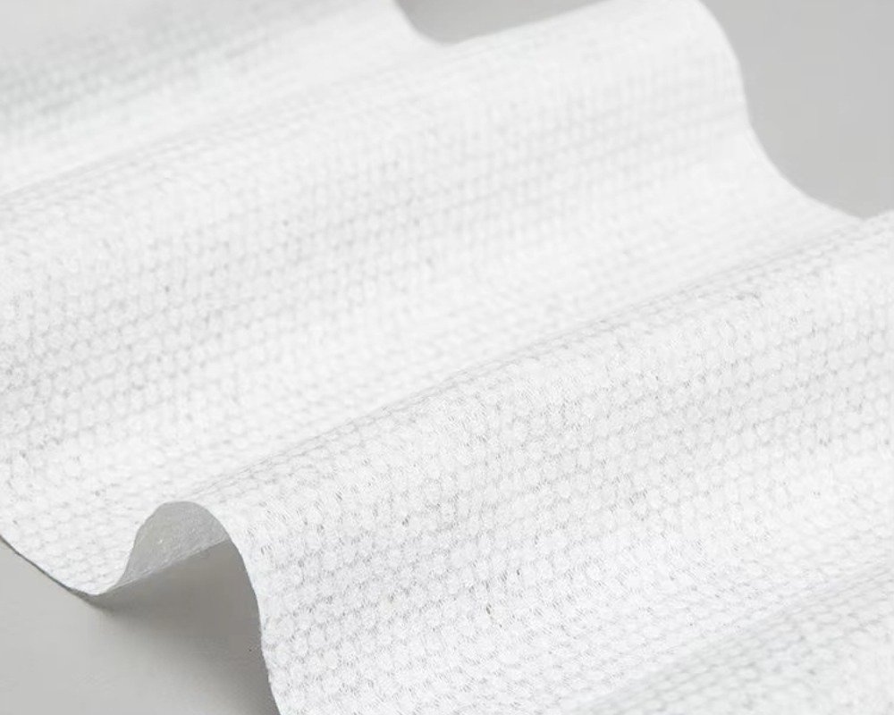 Soft SS bottom non-woven fabric for diapers and sanitary pads